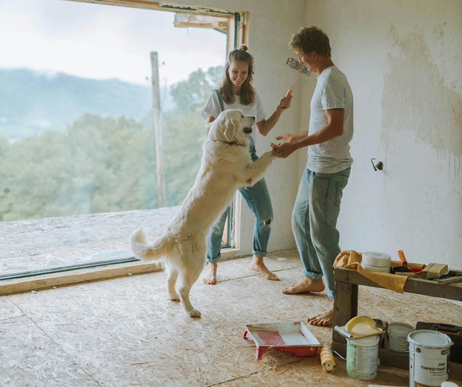 family with dog in new home