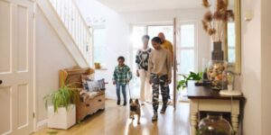 family with a dog buying a home in South Africa